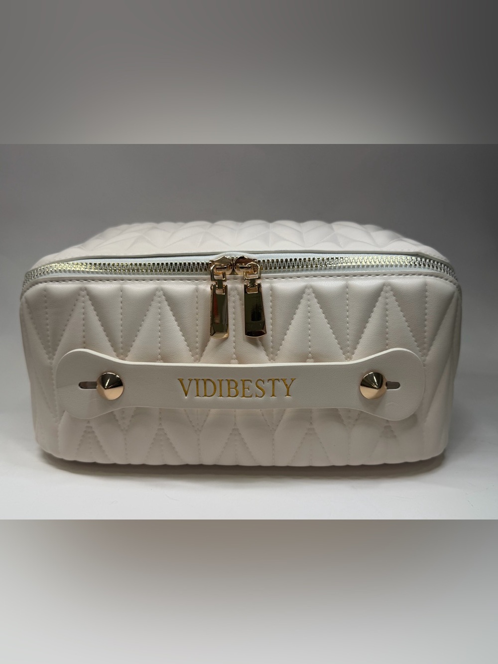 White Quilted Cosmetic Case with Gold Accents